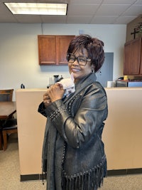 a woman wearing a black jacket